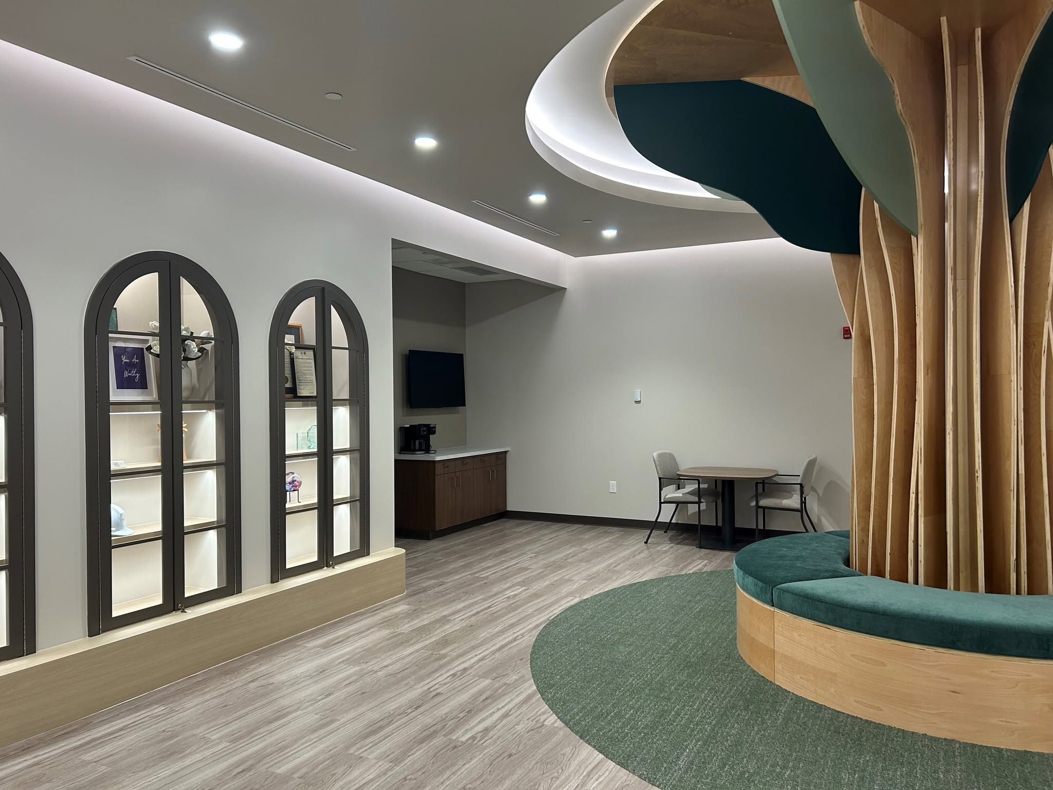 The willow tree sculpture and seating in the Willow at Skyview lobby